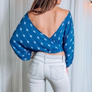 Backless flirty top